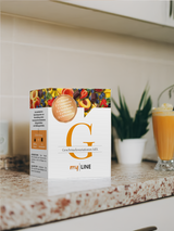 Eine Packung myLINE Geschmacksvariationen-Mix mit einem Shake in der Küche