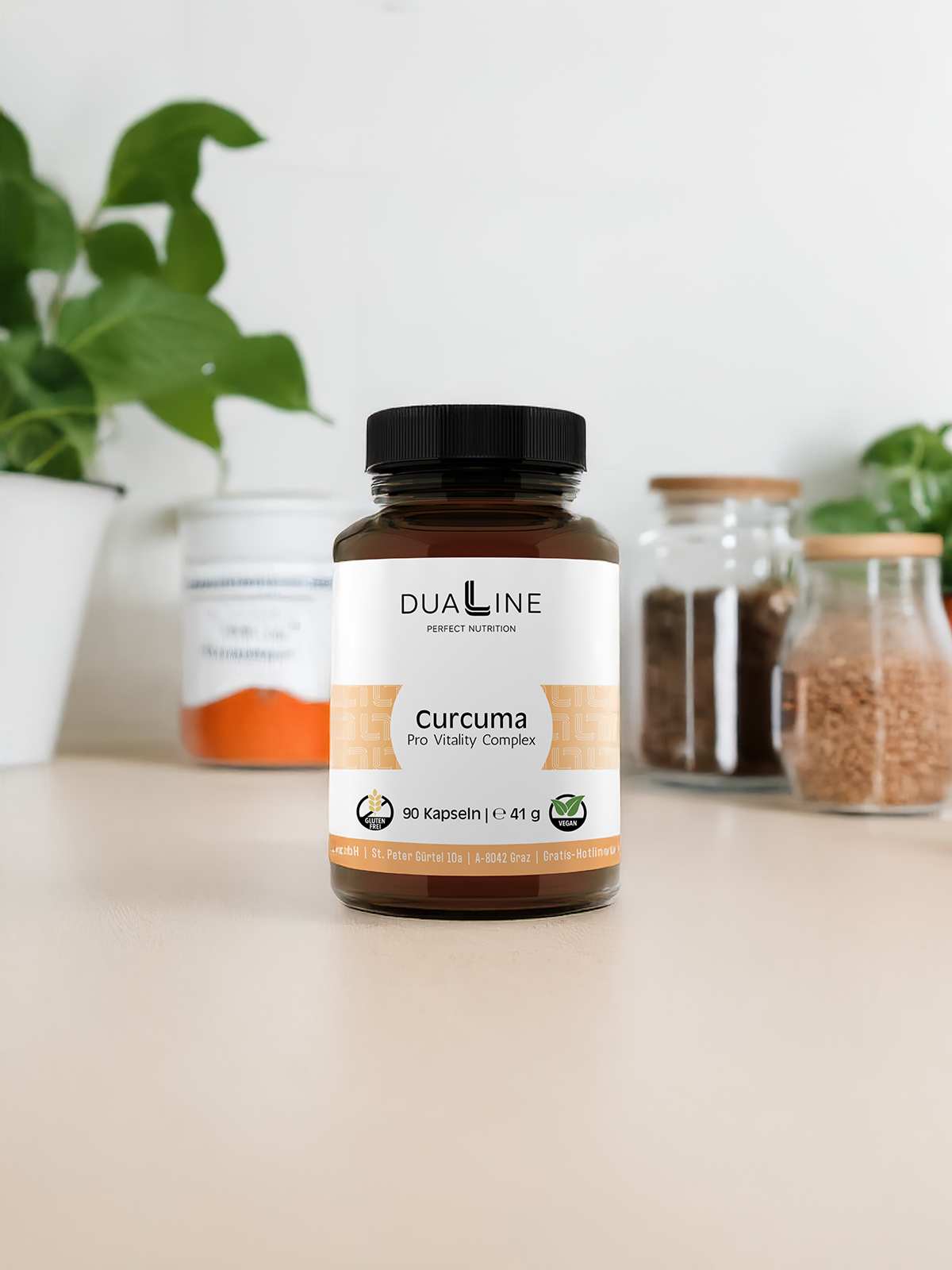 Eine Dose DUALINE Curcuma - Pro Vitality Complex auf einem Tisch