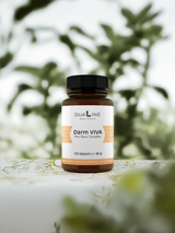 Eine Dose DUALINE Darm VIVA - Pro Flora Complex und im Hintergrund Pflanzen