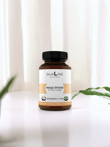 Eine Dose DUALINE Hepa Shield - Pro Bitter Complex unterstützt die Lebergesundheit auf einem Tisch