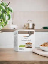 Eine Packung myLINE Schoko-Karamell-Müsli in der Küche